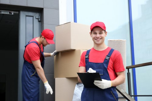 Packing and dismantling office furniture during a Kingston office relocation