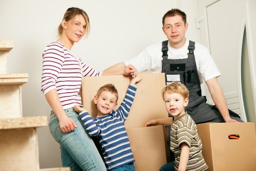 Professional movers loading furniture for a Kingston relocation