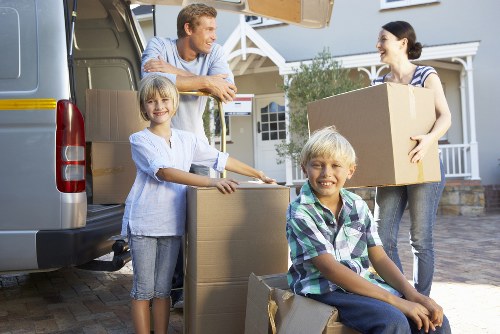 Cardboard cartons, tape, and protective wrapping for local packing needs