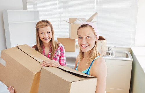 Careful loading of boxes and furniture from a Kingston apartment