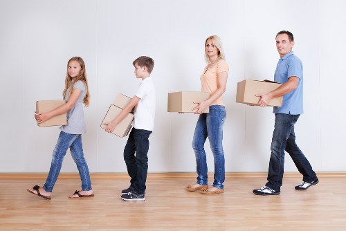 Unpacking boxes into a new property in Kingston upon Thames